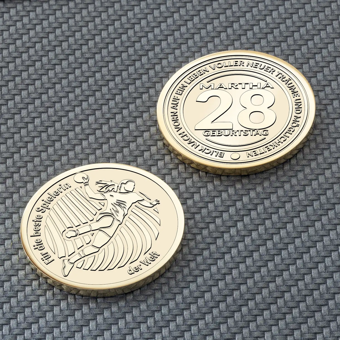Gravierte goldene Münze mit Handballsymbol, Datum und Frauenporträt