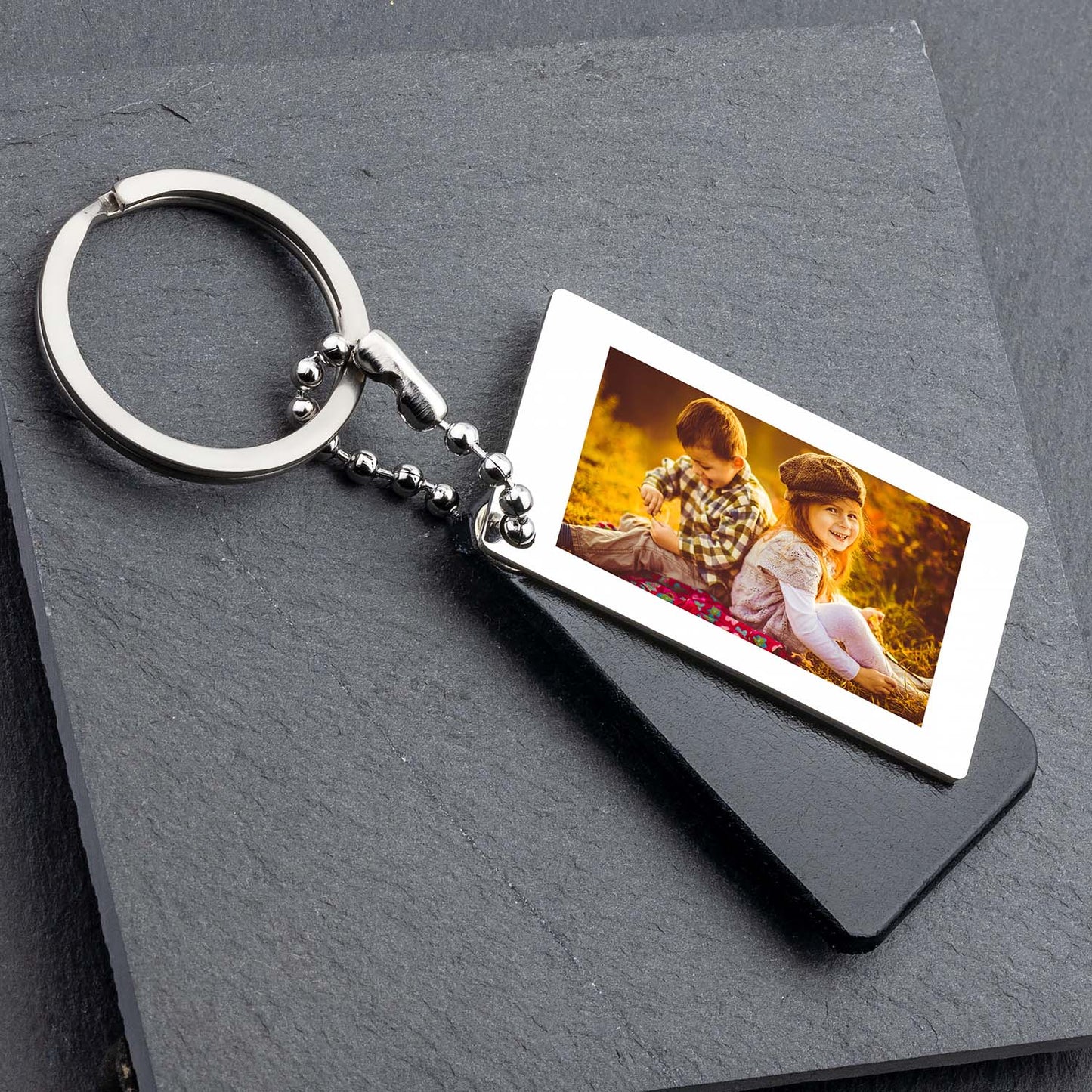 Schlüsselanhänger mit Foto und Gravur: Ihr Unikat aus Schwarz Leder - seQua.Shop